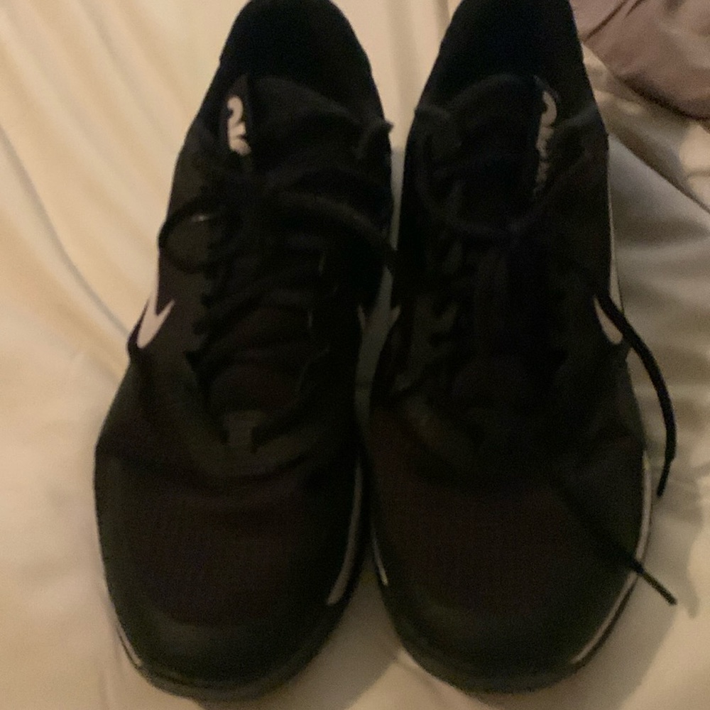 Nike One. Men's size 9. Black and white. Lightly worn. Great condition